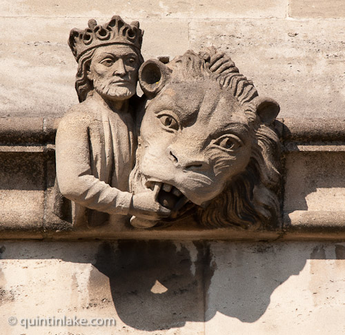 King and Lion Gargoyle below Magdalen Great Tower, part of Magdalen College, Oxford University, England.