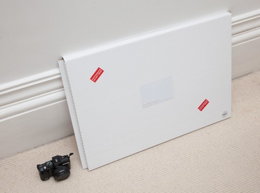 Mailed in a sturdy corrugated cardboard box by special delivery. 