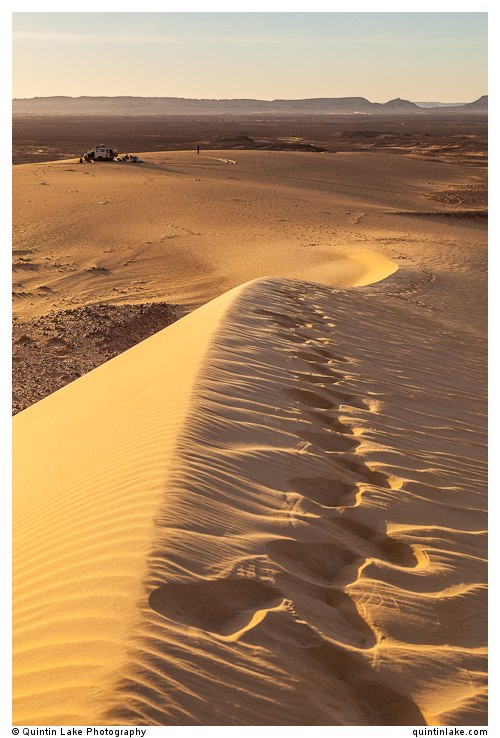 Footprints on a sand dune above camp near Bahariya Oasis, Western Desert, Egypt