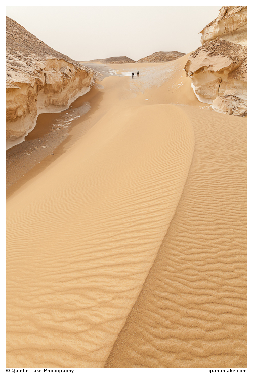 Trekking above a large sand dune in the White Desert), Egypt