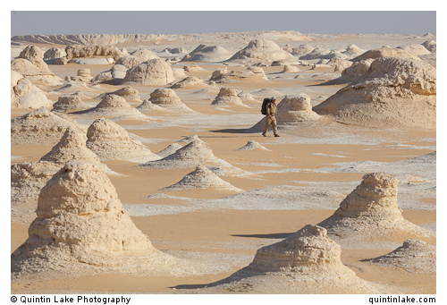Sam McConnell walks amongst the chalk rock formations of the Sahara Beida (White Desert), Egypt
