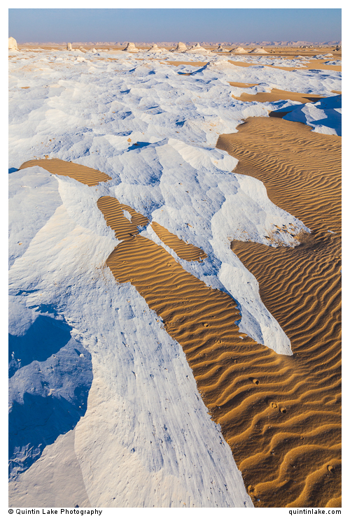Wind sculpted chalk waves and sand in the Sahara Beida (White De
