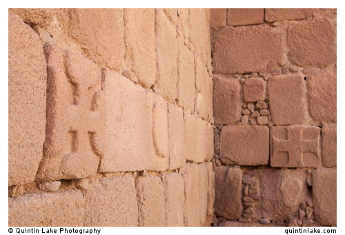 Cross carved in the granite walls 