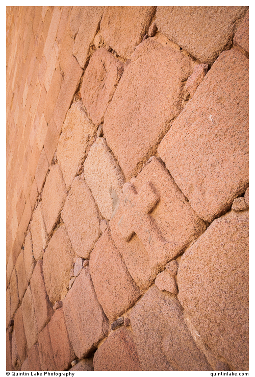 Cross carved in the granite walls 
