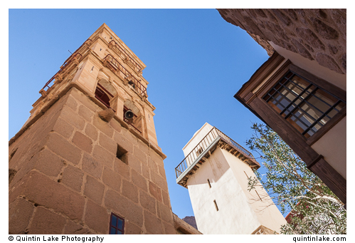 Bell tower (left) & Mosque Minaret (right) inside courtyard 