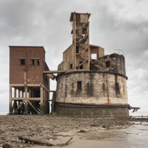 Grain Tower Battery II. Barracks at left. During WW2 the huge chain secured an anti-submarine floating boom across the Medway.