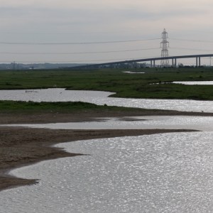 Kingsferry Bridge to the Isle of Sheppey from Chetney Marshes.