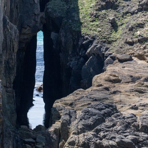Zawn Pyg natural arch at Nanjizal Bay, Cornwall.