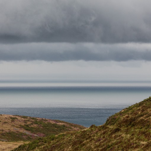 Cloud layers above The Foreland, Exmoor, Devon.