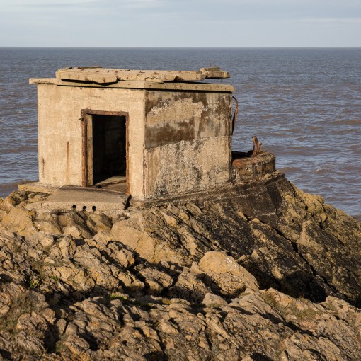 WW2 searchlight position with roof folded back on itself by wave action, Brean Down Fort, Somerset.